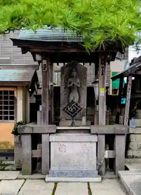 猫実庚申塔の像