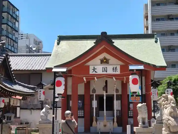 敷津松之宮 大国主神社の{uncategorized: "未分類", other: "その他", undefined: "問題あり", building: "その他建物", grave: "お墓", sacred_gate: "鳥居", guardian: "狛犬", statue: "像", buddha: "仏像", history: "歴史", nature: "自然", garden: "庭園", animal: "動物", pagoda: "塔", temizu: "手水舎", mountain_gate: "山門・神門", sanctuary: "本殿・本堂", subordinate: "末社・摂社", art: "芸術", scenery: "景色", jizo: "地蔵", ema: "絵馬", goshuin: "御朱印", omikuji: "おみくじ", items: "授与品その他", amulet: "お守り", goshuincho: "御朱印帳", eats: "食事", festival: "お祭り", votive_dance: "神楽", shichigosan: "七五三参", wedding: "結婚式", experience: "体験その他", initially: "初詣", around: "周辺", anti_infection: "感染症対策"}