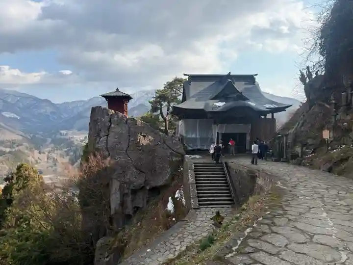 宝珠山 立石寺の{uncategorized: "未分類", other: "その他", undefined: "問題あり", building: "その他建物", grave: "お墓", sacred_gate: "鳥居", guardian: "狛犬", statue: "像", buddha: "仏像", history: "歴史", nature: "自然", garden: "庭園", animal: "動物", pagoda: "塔", temizu: "手水舎", mountain_gate: "山門・神門", sanctuary: "本殿・本堂", subordinate: "末社・摂社", art: "芸術", scenery: "景色", jizo: "地蔵", ema: "絵馬", goshuin: "御朱印", omikuji: "おみくじ", items: "授与品その他", amulet: "お守り", goshuincho: "御朱印帳", eats: "食事", festival: "お祭り", votive_dance: "神楽", shichigosan: "七五三参", wedding: "結婚式", experience: "体験その他", initially: "初詣", around: "周辺", anti_infection: "感染症対策"}