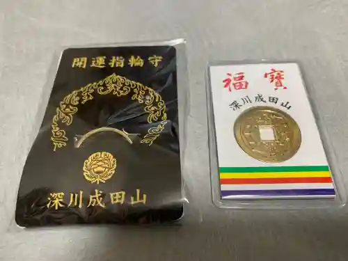 成田山深川不動堂（新勝寺東京別院）の{uncategorized: "未分類", other: "その他", undefined: "問題あり", building: "その他建物", grave: "お墓", sacred_gate: "鳥居", guardian: "狛犬", statue: "像", buddha: "仏像", history: "歴史", nature: "自然", garden: "庭園", animal: "動物", pagoda: "塔", temizu: "手水舎", mountain_gate: "山門・神門", sanctuary: "本殿・本堂", subordinate: "末社・摂社", art: "芸術", scenery: "景色", jizo: "地蔵", ema: "絵馬", goshuin: "御朱印", omikuji: "おみくじ", items: "授与品その他", amulet: "お守り", goshuincho: "御朱印帳", eats: "食事", festival: "お祭り", votive_dance: "神楽", shichigosan: "七五三参", wedding: "結婚式", experience: "体験その他", initially: "初詣", around: "周辺", anti_infection: "感染症対策"}