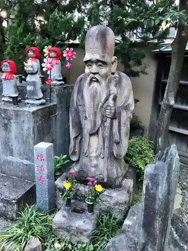 栄閑院の像