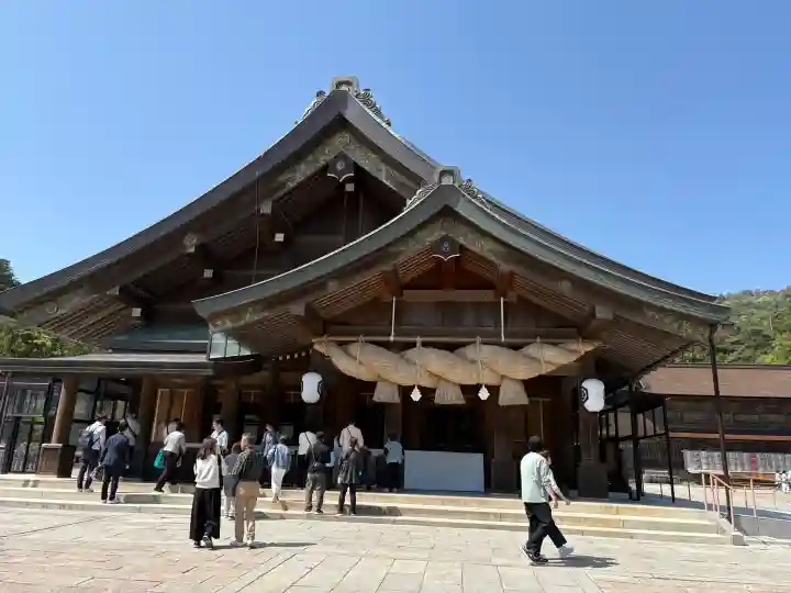 出雲大社の{uncategorized: "未分類", other: "その他", undefined: "問題あり", building: "その他建物", grave: "お墓", sacred_gate: "鳥居", guardian: "狛犬", statue: "像", buddha: "仏像", history: "歴史", nature: "自然", garden: "庭園", animal: "動物", pagoda: "塔", temizu: "手水舎", mountain_gate: "山門・神門", sanctuary: "本殿・本堂", subordinate: "末社・摂社", art: "芸術", scenery: "景色", jizo: "地蔵", ema: "絵馬", goshuin: "御朱印", omikuji: "おみくじ", items: "授与品その他", amulet: "お守り", goshuincho: "御朱印帳", eats: "食事", festival: "お祭り", votive_dance: "神楽", shichigosan: "七五三参", wedding: "結婚式", experience: "体験その他", initially: "初詣", around: "周辺", anti_infection: "感染症対策"}