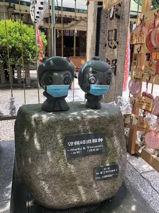 露天神社(お初天神)の像