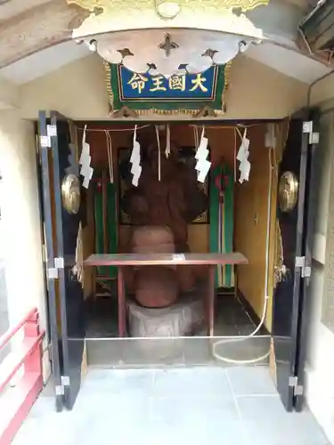 須賀神社の像