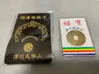 成田山深川不動堂(新勝寺東京別院)の{uncategorized: "未分類", other: "その他", undefined: "問題あり", building: "その他建物", grave: "お墓", sacred_gate: "鳥居", guardian: "狛犬", statue: "像", buddha: "仏像", history: "歴史", nature: "自然", garden: "庭園", animal: "動物", pagoda: "塔", temizu: "手水舎", mountain_gate: "山門・神門", sanctuary: "本殿・本堂", subordinate: "末社・摂社", art: "芸術", scenery: "景色", jizo: "地蔵", ema: "絵馬", goshuin: "御朱印", omikuji: "おみくじ", items: "授与品その他", amulet: "お守り", goshuincho: "御朱印帳", eats: "食事", festival: "お祭り", votive_dance: "神楽", shichigosan: "七五三参", wedding: "結婚式", experience: "体験その他", initially: "初詣", around: "周辺", anti_infection: "感染症対策"}