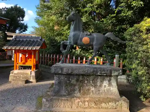 揖宿神社の像