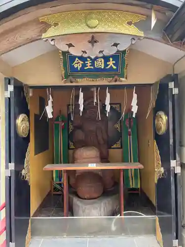 須賀神社の像