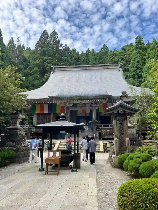 宝珠山 立石寺の{uncategorized: "未分類", other: "その他", undefined: "問題あり", building: "その他建物", grave: "お墓", sacred_gate: "鳥居", guardian: "狛犬", statue: "像", buddha: "仏像", history: "歴史", nature: "自然", garden: "庭園", animal: "動物", pagoda: "塔", temizu: "手水舎", mountain_gate: "山門・神門", sanctuary: "本殿・本堂", subordinate: "末社・摂社", art: "芸術", scenery: "景色", jizo: "地蔵", ema: "絵馬", goshuin: "御朱印", omikuji: "おみくじ", items: "授与品その他", amulet: "お守り", goshuincho: "御朱印帳", eats: "食事", festival: "お祭り", votive_dance: "神楽", shichigosan: "七五三参", wedding: "結婚式", experience: "体験その他", initially: "初詣", around: "周辺", anti_infection: "感染症対策"}