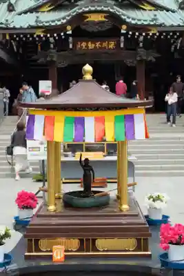 成田山深川不動堂(新勝寺東京別院)の{uncategorized: "未分類", other: "その他", undefined: "問題あり", building: "その他建物", grave: "お墓", sacred_gate: "鳥居", guardian: "狛犬", statue: "像", buddha: "仏像", history: "歴史", nature: "自然", garden: "庭園", animal: "動物", pagoda: "塔", temizu: "手水舎", mountain_gate: "山門・神門", sanctuary: "本殿・本堂", subordinate: "末社・摂社", art: "芸術", scenery: "景色", jizo: "地蔵", ema: "絵馬", goshuin: "御朱印", omikuji: "おみくじ", items: "授与品その他", amulet: "お守り", goshuincho: "御朱印帳", eats: "食事", festival: "お祭り", votive_dance: "神楽", shichigosan: "七五三参", wedding: "結婚式", experience: "体験その他", initially: "初詣", around: "周辺", anti_infection: "感染症対策"}