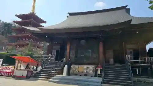 高幡不動尊　金剛寺の{uncategorized: "未分類", other: "その他", undefined: "問題あり", building: "その他建物", grave: "お墓", sacred_gate: "鳥居", guardian: "狛犬", statue: "像", buddha: "仏像", history: "歴史", nature: "自然", garden: "庭園", animal: "動物", pagoda: "塔", temizu: "手水舎", mountain_gate: "山門・神門", sanctuary: "本殿・本堂", subordinate: "末社・摂社", art: "芸術", scenery: "景色", jizo: "地蔵", ema: "絵馬", goshuin: "御朱印", omikuji: "おみくじ", items: "授与品その他", amulet: "お守り", goshuincho: "御朱印帳", eats: "食事", festival: "お祭り", votive_dance: "神楽", shichigosan: "七五三参", wedding: "結婚式", experience: "体験その他", initially: "初詣", around: "周辺", anti_infection: "感染症対策"}
