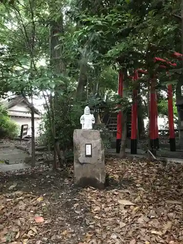 鎮守氷川神社の像