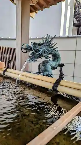 成田山　薬師堂（旧本堂）の手水舎