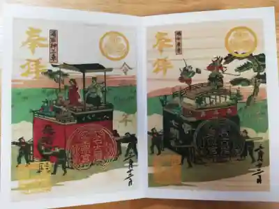 山車を描いた檜の御朱印。名古屋東照宮神事山車曳出乃図より左の御朱印は万治元年1658年桑名町湯取車、右の御朱印は元和6年1620年七間町橘弁慶車。右は牛若丸と弁慶の出会う場面を山車の上で演じています。