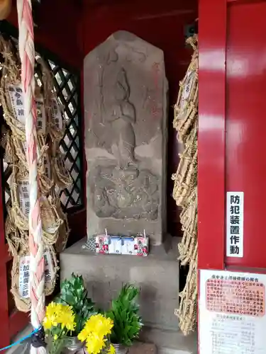 庚申塚（鳩森八幡神社社外）の仏像