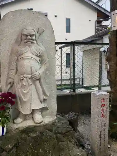 子神社の像