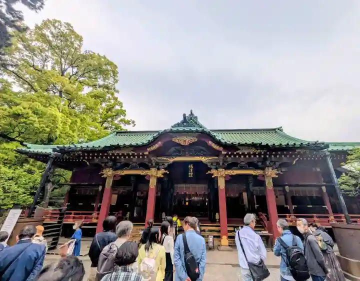 根津神社の{uncategorized: "未分類", other: "その他", undefined: "問題あり", building: "その他建物", grave: "お墓", sacred_gate: "鳥居", guardian: "狛犬", statue: "像", buddha: "仏像", history: "歴史", nature: "自然", garden: "庭園", animal: "動物", pagoda: "塔", temizu: "手水舎", mountain_gate: "山門・神門", sanctuary: "本殿・本堂", subordinate: "末社・摂社", art: "芸術", scenery: "景色", jizo: "地蔵", ema: "絵馬", goshuin: "御朱印", omikuji: "おみくじ", items: "授与品その他", amulet: "お守り", goshuincho: "御朱印帳", eats: "食事", festival: "お祭り", votive_dance: "神楽", shichigosan: "七五三参", wedding: "結婚式", experience: "体験その他", initially: "初詣", around: "周辺", anti_infection: "感染症対策"}