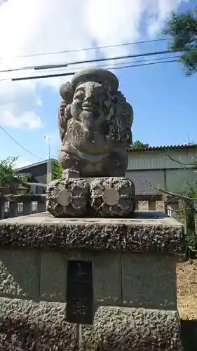 神明社の像