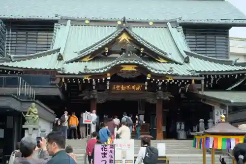 成田山深川不動堂（新勝寺東京別院）の{uncategorized: "未分類", other: "その他", undefined: "問題あり", building: "その他建物", grave: "お墓", sacred_gate: "鳥居", guardian: "狛犬", statue: "像", buddha: "仏像", history: "歴史", nature: "自然", garden: "庭園", animal: "動物", pagoda: "塔", temizu: "手水舎", mountain_gate: "山門・神門", sanctuary: "本殿・本堂", subordinate: "末社・摂社", art: "芸術", scenery: "景色", jizo: "地蔵", ema: "絵馬", goshuin: "御朱印", omikuji: "おみくじ", items: "授与品その他", amulet: "お守り", goshuincho: "御朱印帳", eats: "食事", festival: "お祭り", votive_dance: "神楽", shichigosan: "七五三参", wedding: "結婚式", experience: "体験その他", initially: "初詣", around: "周辺", anti_infection: "感染症対策"}