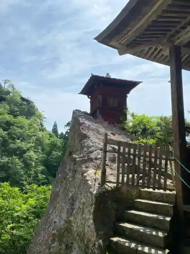 宝珠山 立石寺の{uncategorized: "未分類", other: "その他", undefined: "問題あり", building: "その他建物", grave: "お墓", sacred_gate: "鳥居", guardian: "狛犬", statue: "像", buddha: "仏像", history: "歴史", nature: "自然", garden: "庭園", animal: "動物", pagoda: "塔", temizu: "手水舎", mountain_gate: "山門・神門", sanctuary: "本殿・本堂", subordinate: "末社・摂社", art: "芸術", scenery: "景色", jizo: "地蔵", ema: "絵馬", goshuin: "御朱印", omikuji: "おみくじ", items: "授与品その他", amulet: "お守り", goshuincho: "御朱印帳", eats: "食事", festival: "お祭り", votive_dance: "神楽", shichigosan: "七五三参", wedding: "結婚式", experience: "体験その他", initially: "初詣", around: "周辺", anti_infection: "感染症対策"}