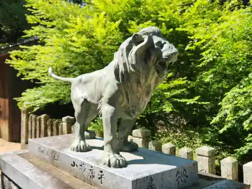 與位神社の像