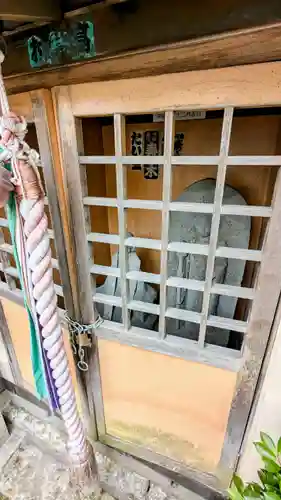 猫実庚申塔の像