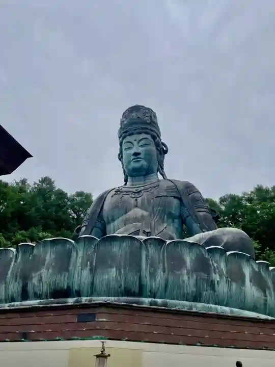 青龍寺(昭和大仏)の{uncategorized: "未分類", other: "その他", undefined: "問題あり", building: "その他建物", grave: "お墓", sacred_gate: "鳥居", guardian: "狛犬", statue: "像", buddha: "仏像", history: "歴史", nature: "自然", garden: "庭園", animal: "動物", pagoda: "塔", temizu: "手水舎", mountain_gate: "山門・神門", sanctuary: "本殿・本堂", subordinate: "末社・摂社", art: "芸術", scenery: "景色", jizo: "地蔵", ema: "絵馬", goshuin: "御朱印", omikuji: "おみくじ", items: "授与品その他", amulet: "お守り", goshuincho: "御朱印帳", eats: "食事", festival: "お祭り", votive_dance: "神楽", shichigosan: "七五三参", wedding: "結婚式", experience: "体験その他", initially: "初詣", around: "周辺", anti_infection: "感染症対策"}