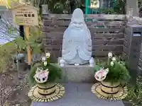 祠(東京ドームシティー屋上)の像