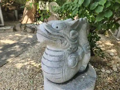 綱敷天満神社の像