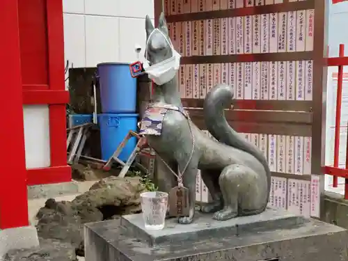 装束稲荷神社（王子稲荷神社境外摂社）の狛犬